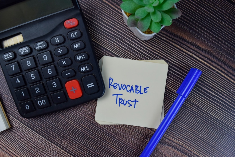 RevocableTrustWriteOnStickyNotesIsolatedOnWoodenTable